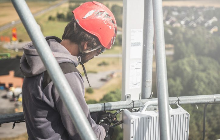 Telecommunication manual high worker engineer installing new 3g 4g LTE antenna