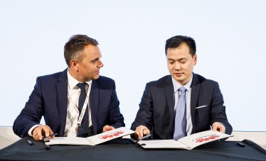 Paul Garston signing Huawei Memorandum